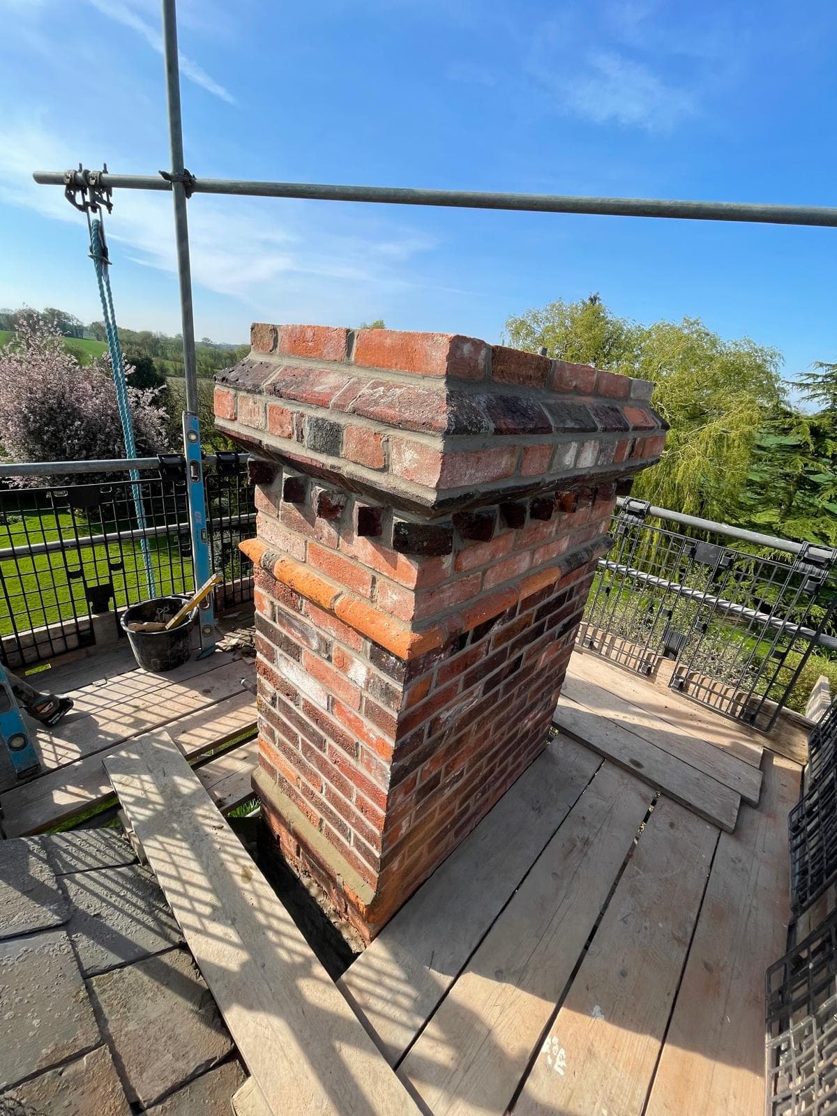 Rebuilt chimney stack with new pots and leadwork