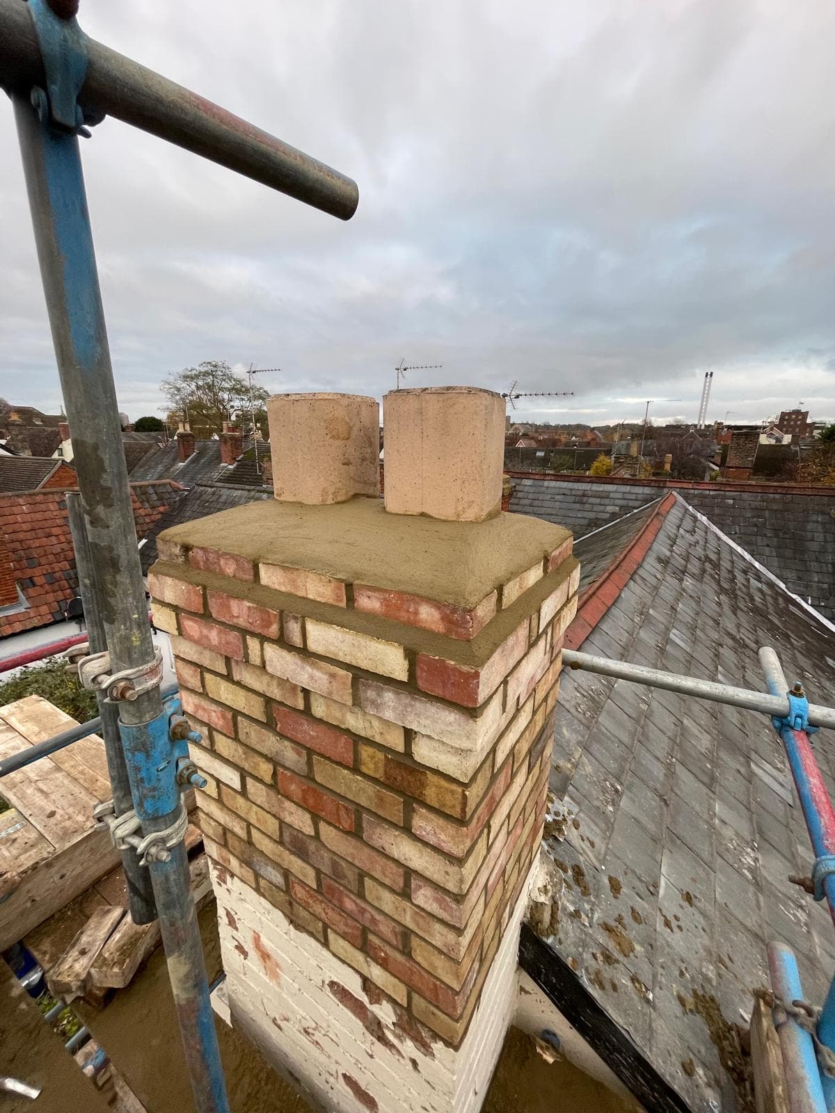 Chimney stack rebuilt above roofline